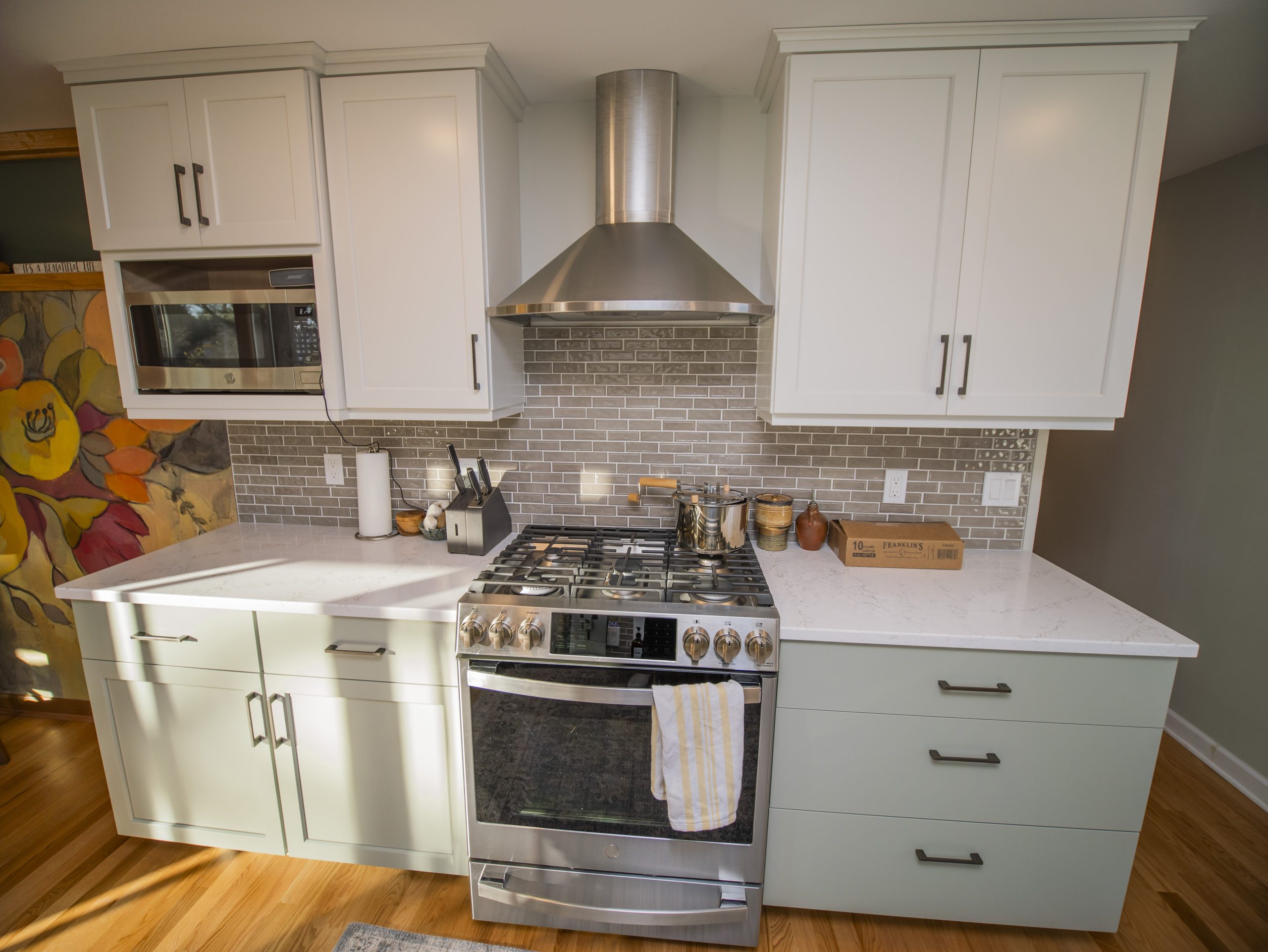 modern kitchen with stove in middle